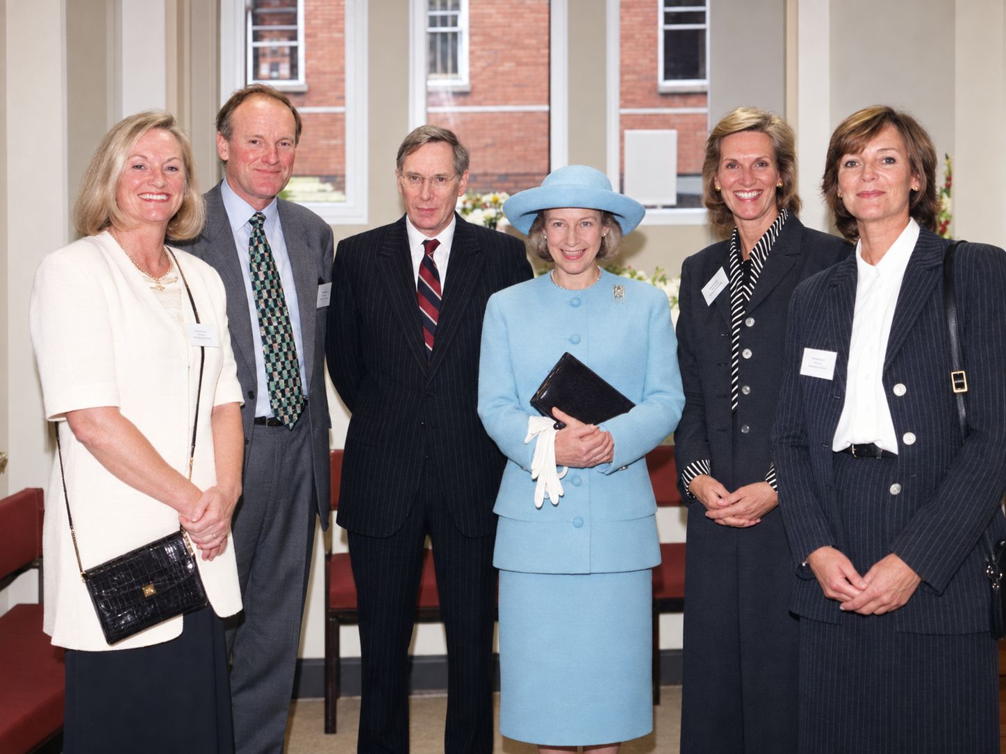 The Duchess of Gloucester with family trustees and guests at the formal opening