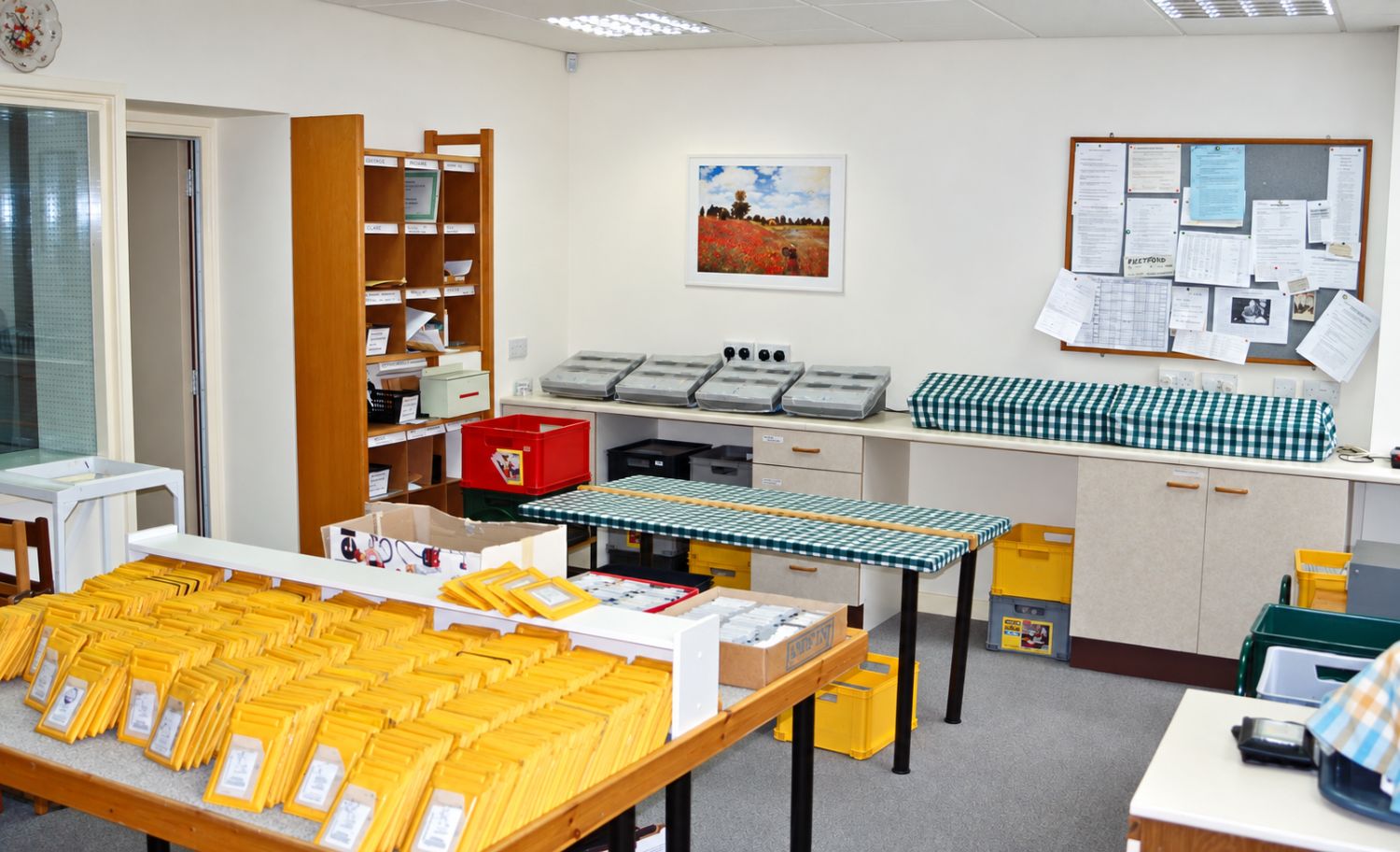 The Talking Newspaper production room in 1996, with wallets of cassettes ready for posting